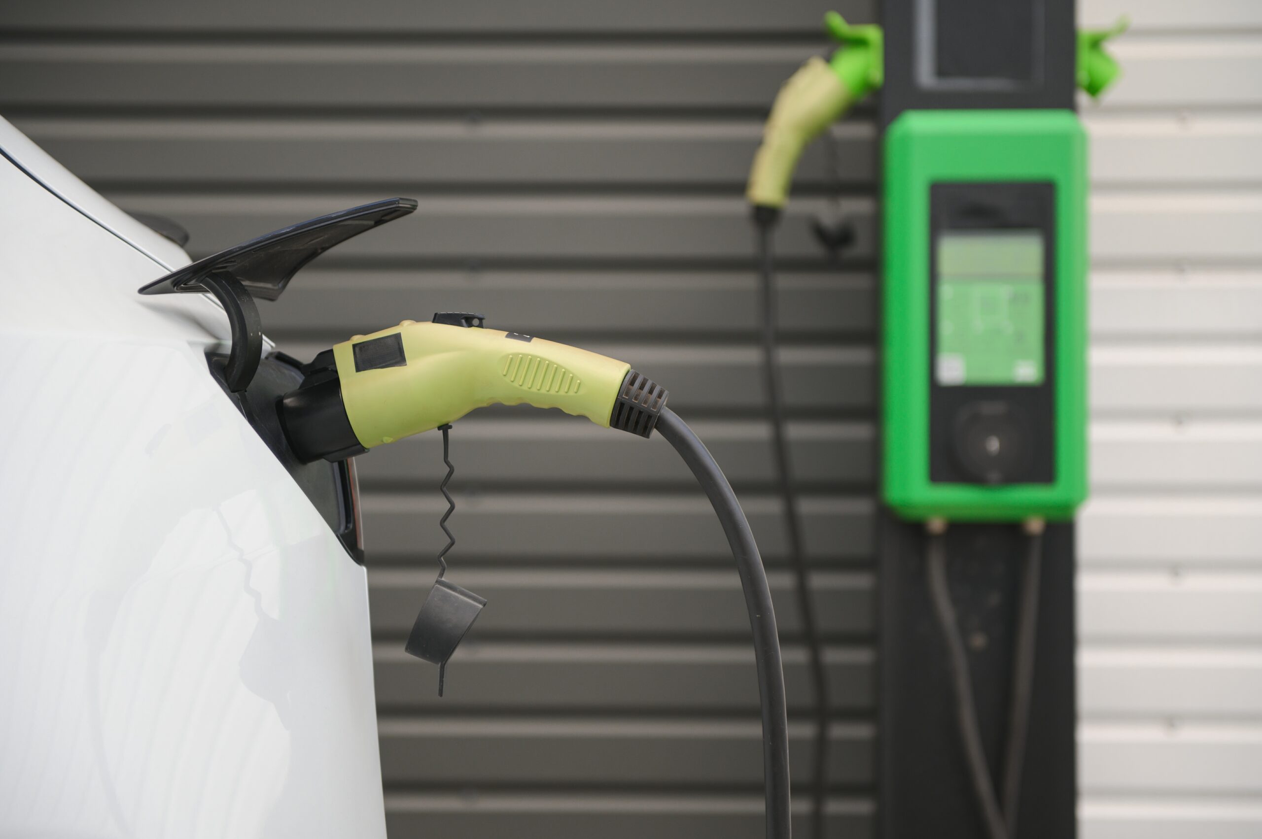 Electric cars charged on a charging station.